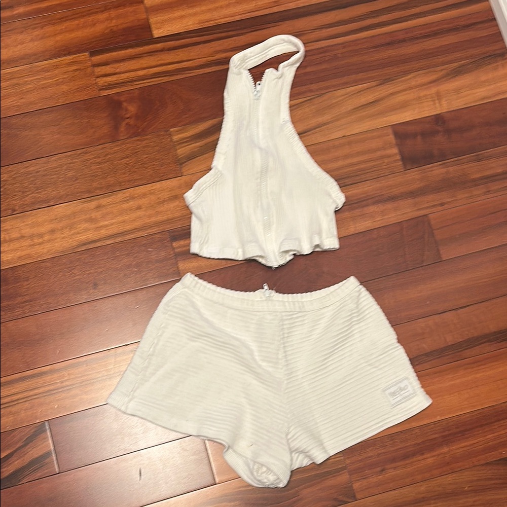 White Ribbed Apparel with Logo Patch